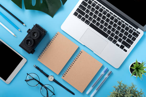 istock Concept of stylized home office table with fashion accessories, minimal interior, workspace design, close up, flat lay, copy space, top view, mockup 1089678372