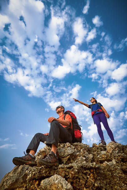 istock Adventure trek along the coast with a backpack in the summer. 1089682838