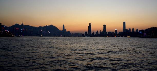 istock Hong Kong and Victoria Harbour at sunset 1089684384