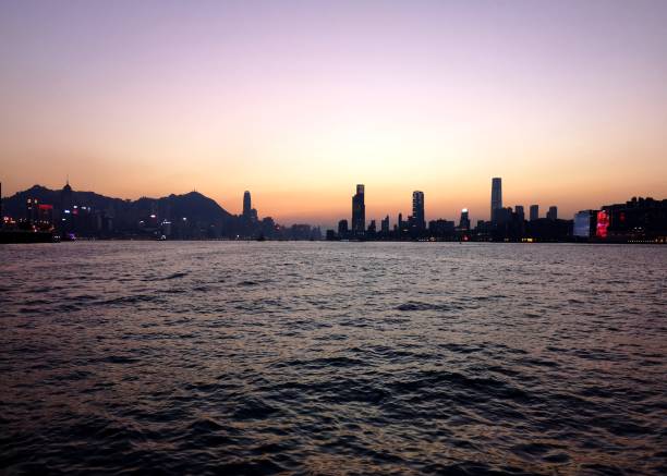 istock Hong Kong and Victoria Harbour at sunset 1089684540