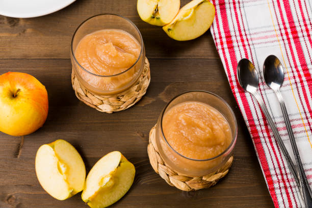 istock Apple mousse in glasses on a wooden table 1089688438