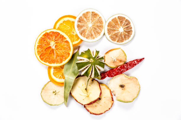 Vibrant dried fruits isolated on white background