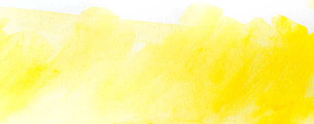 istock yellow watercolor stain drawn by hand. on paper with texture. 1089698102