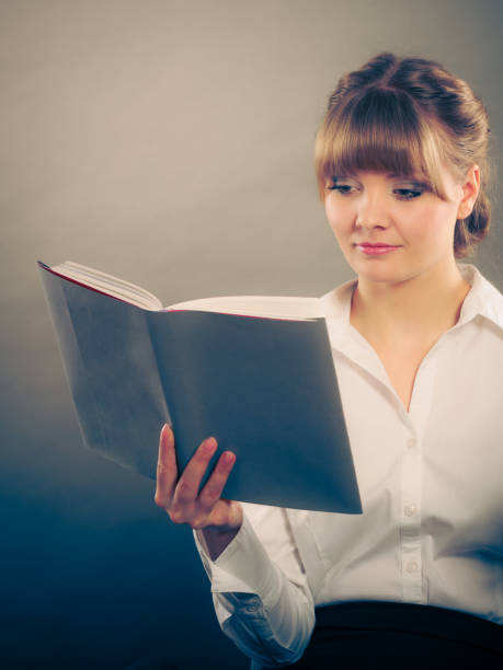 istock Woman learning reading book. Education leisure. 1089698280