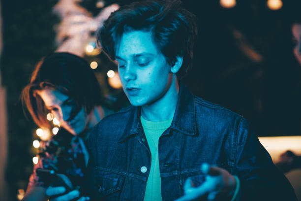 istock Teenage boy looking at his phone while dancing 1089705782