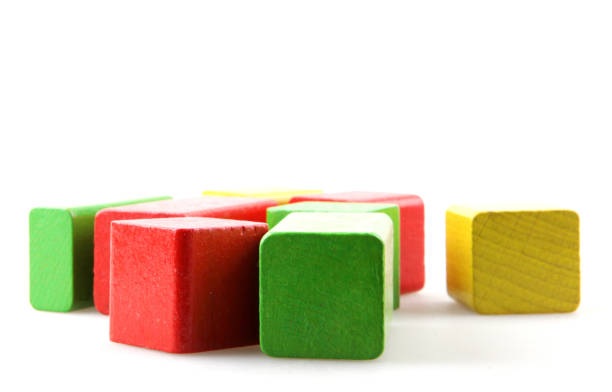 istock Wooden building blocks isolated on white 1089705804