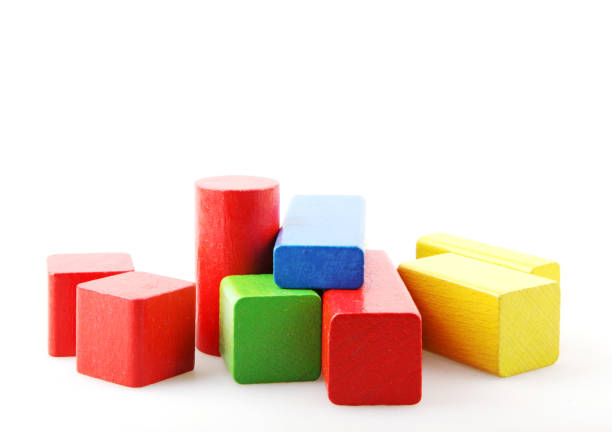 istock Wooden building blocks isolated on white 1089705856