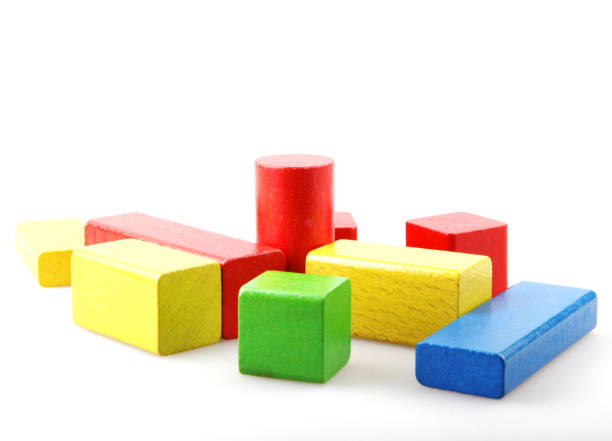 istock Wooden building blocks isolated on white 1089705912