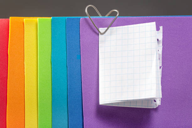 istock A rainbow colored note paper with a heart clip 1089708238