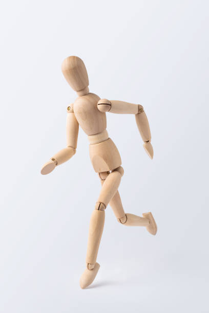 istock running wooden mannequin isolated on white background 1089714760