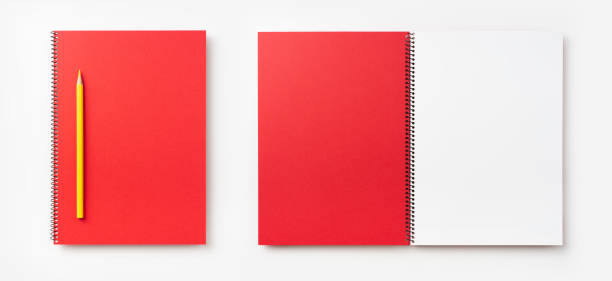 istock Top view of  red spiral notebook, page, pencil 1089715594