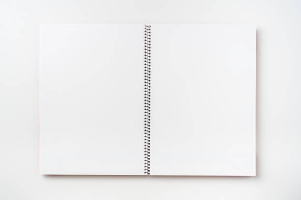 istock Top view of  red spiral notebook, page, pencil 1089717496