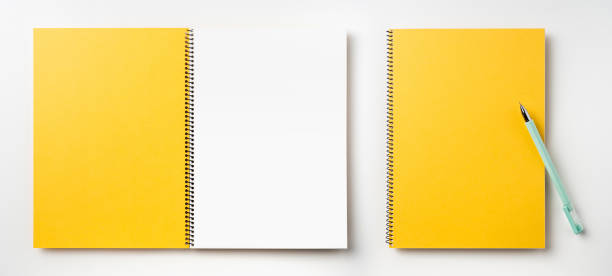 istock Top view of yellow spiral notebook, page, pencil 1089717552