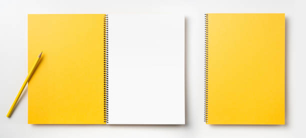 istock Top view of yellow spiral notebook, page, pencil 1089717830