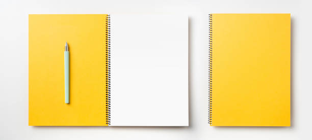 istock Top view of yellow spiral notebook, page, pencil 1089717876
