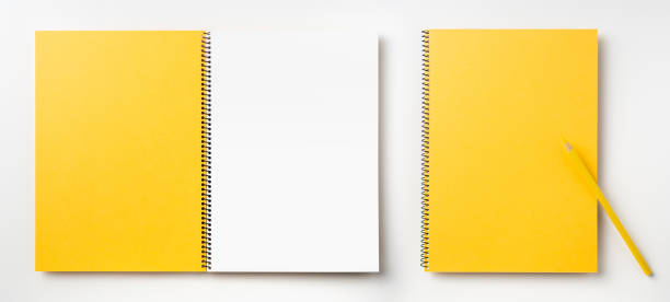 istock Top view of yellow spiral notebook, page, pencil 1089717990
