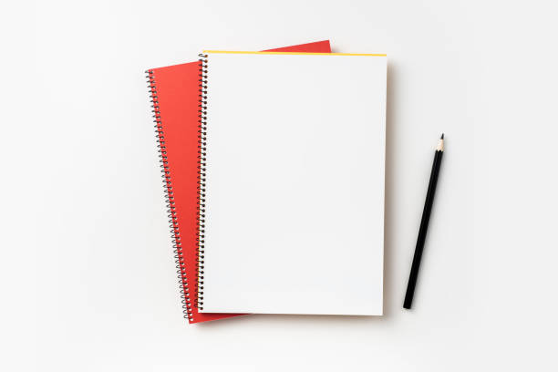 istock Top view of yellow and red spiral notebook 1089718296