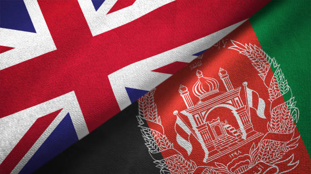 istock Afghanistan and United Kingdom two flags together realations textile cloth fabric texture 1089726096