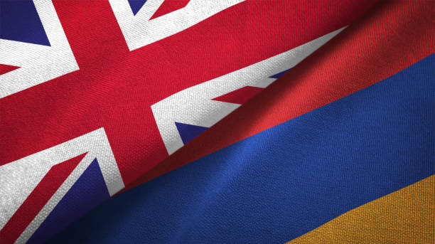 istock Armenia and United Kingdom two flags together realations textile cloth fabric texture 1089726100