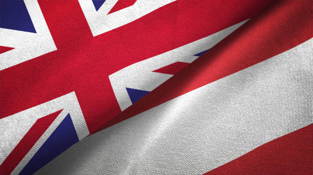 istock Austria and United Kingdom two flags together realations textile cloth fabric texture 1089726144