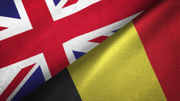 istock Belgium and United Kingdom two flags together realations textile cloth fabric texture 1089726194