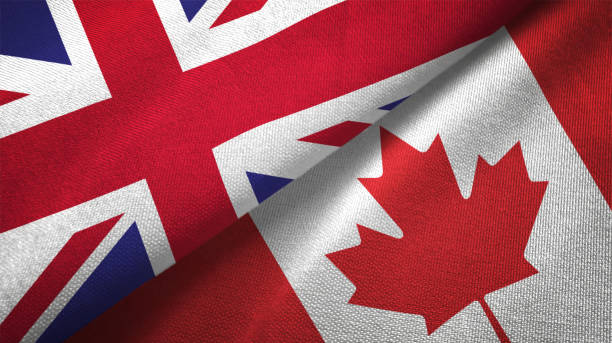 istock Canada and United Kingdom two flags together realations textile cloth fabric texture 1089726266