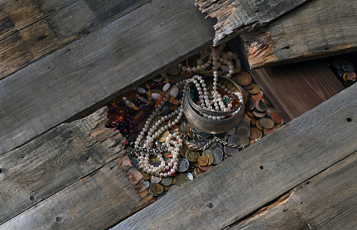 treasure of coins and jewels under the floor boards