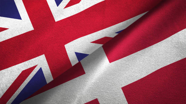 istock Denmark and United Kingdom two flags together realations textile cloth fabric texture 1089726336