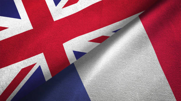 France and United Kingdom two flags together realations textile cloth fabric texture France and United Kingdom flag together realtions textile cloth fabric texture french flag photos stock pictures, royalty-free photos & images