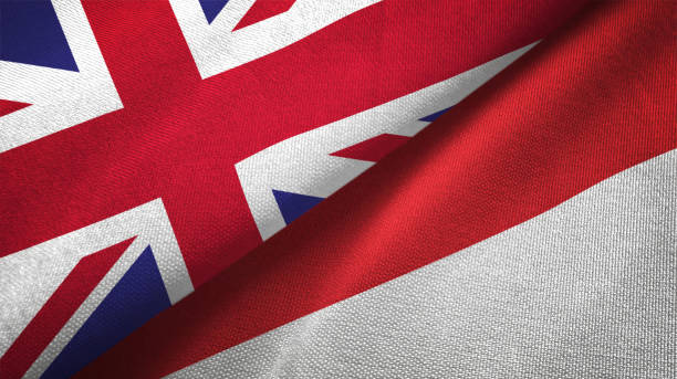 istock Indonesia - Monaco and United Kingdom two flags together realations textile cloth fabric texture 1089726530