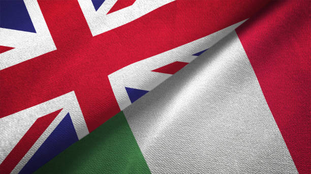 istock Italy and United Kingdom two flags together realations textile cloth fabric texture 1089727566