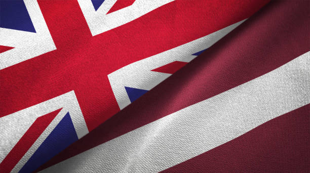 istock Latvia and United Kingdom two flags together realations textile cloth fabric texture 1089727674