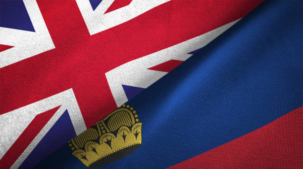 istock Liechtenstein and United Kingdom two flags together realations textile cloth fabric texture 1089727714