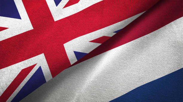 istock Netherlands and United Kingdom two flags together realations textile cloth fabric texture 1089727838
