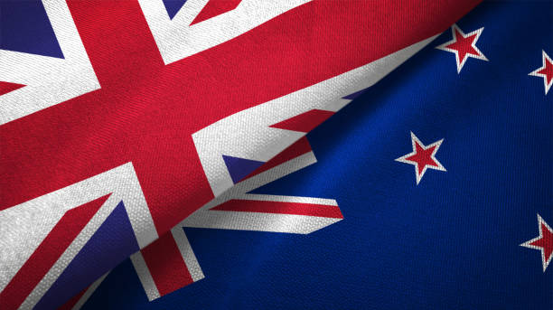 nouvelle zélande et royaume-uni deux drapeaux realations ensemble textile tissu tissu texture - new zealand flag photos photos et images de collection