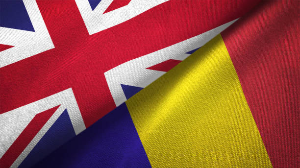 istock Romania and United Kingdom two flags together realations textile cloth fabric texture 1089727982
