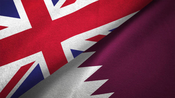 istock Qatar and United Kingdom two flags together realations textile cloth fabric texture 1089727984