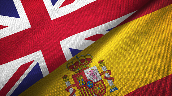 Spain and United Kingdom flag together realtions textile cloth fabric texture