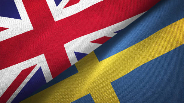 istock Sweden and United Kingdom two flags together realations textile cloth fabric texture 1089728168
