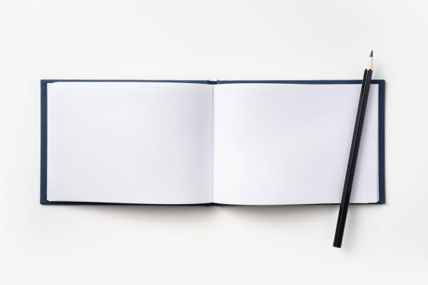 istock Top view of blue hardcover notebook and pencil 1089728920