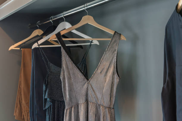 istock modern closet with clothes hanging 1089730720