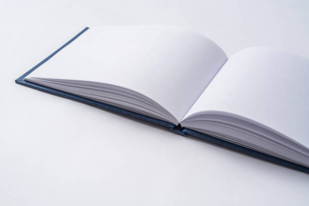 perspektive blau notebook mit geöffneten seite - book open page hardcover book stock-fotos und bilder