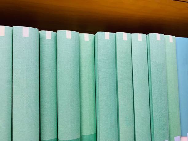 row of generic green hardcover books - library book shelf generic imagens e fotografias de stock