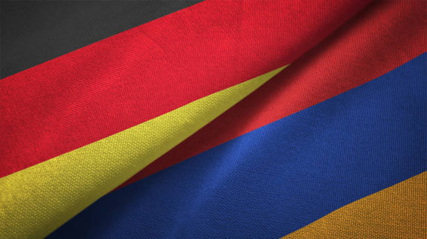 istock Armenia and Germany two flags together realations textile cloth fabric texture 1089734660