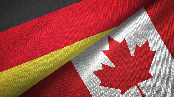 Canada and Germany flag together realtions textile cloth fabric texture