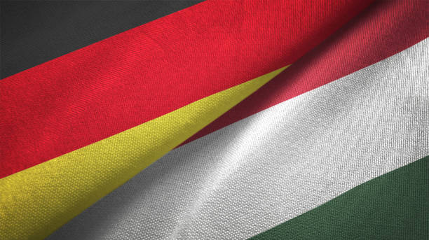 istock Hungary and Germany two flags together realations textile cloth fabric texture 1089736482