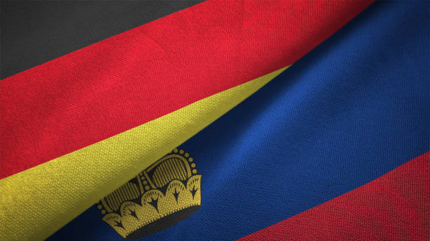 istock Liechtenstein and Germany two flags together realations textile cloth fabric texture 1089736914