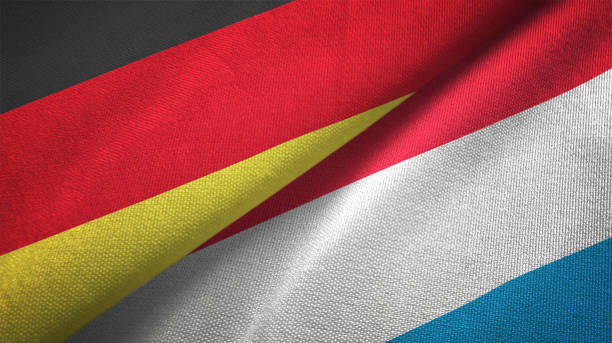 istock Luxembourg and Germany two flags together realations textile cloth fabric texture 1089736920