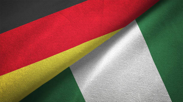 istock Nigeria and Germany two flags together realations textile cloth fabric texture 1089737160