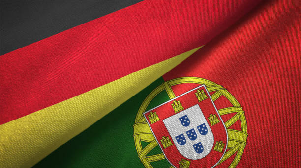 istock Portugal and Germany two flags together realations textile cloth fabric texture 1089737236